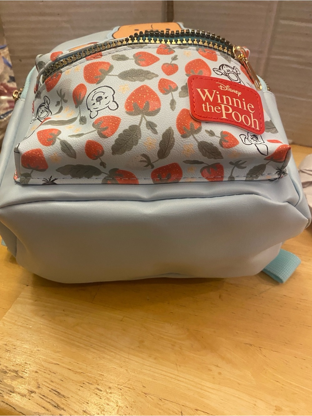 Disney Winnie the Pooh Blue mini Backpack w front zippered pocket w strawberries - Picture 6 of 7